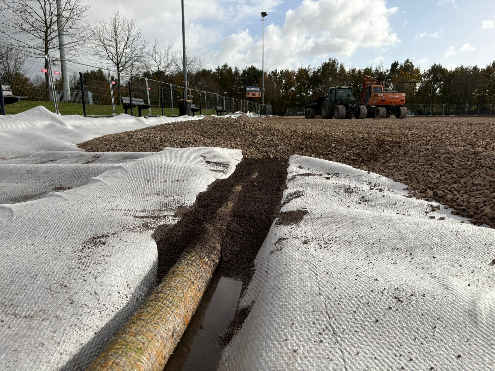 Grauwacke-sportveld-waber-systeem